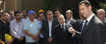 Bachar el Asad (derecha), el miércoles, en una rara aparición pública.