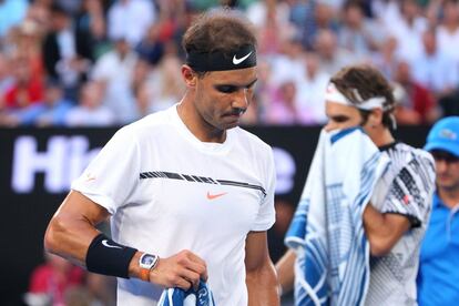 El manacorñí Rafael Nadal (en prime plano) en un descanso junto con suizo Roger Federer.