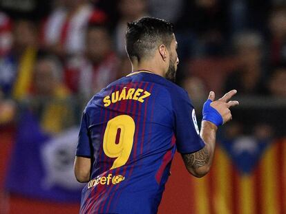 Luis Suárez celebra su gol ante el Girona.