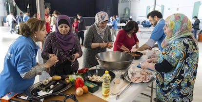 Spanish volunteers at a recent event in Madrid to help integrate Syrian refugees.