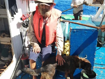 Australian Timothy Lyndsay Shaddock and his dog Bella after being rescued by a Grupomar vessel in the Pacific Ocean, Mexico, on July 17, 2023.