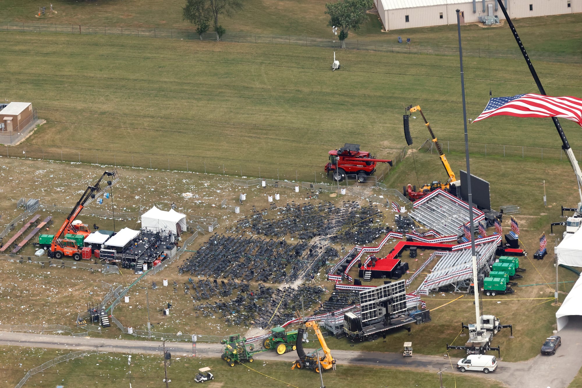 An aerial view shows the site during the law enforcement investigation into gunfire at a campaign rally of Republican presidential candidate and former U.S. President Donald Trump, in Butler, Pennsylvania, U.S. July 14, 2024.   REUTERS/Brendan McDermid