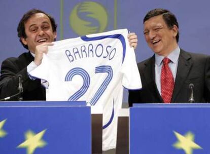 Platini y Barroso, en la presentación del partido.