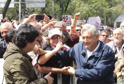 Andrés Manuel López Obrador (right) greets supporters on Sunday.