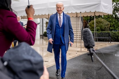 President Joe Biden walks to reporters on the South Lawn of the White House before boarding Marine One in Washington, Tuesday, Jan. 31, 2023.