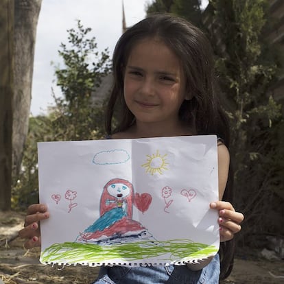 Rauan Taleb, 6, Síria. "Essa sou eu. Eu adoro desenhar. Me faz sentir como se eu estivesse dentro do meu próprio sonho".