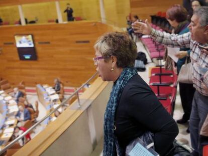 Afectados por el fraude de las participaciones preferentes gritan desde la tribuna de público a los diputados