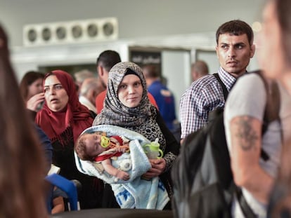 The Al Said family waits inside Beirut airport for their flight to Spain.