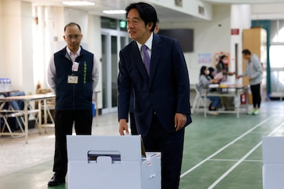 Lai Ching-te, Taiwan's vice president, votes in the elections won Saturday by his party, the Democratic Progressive Party.