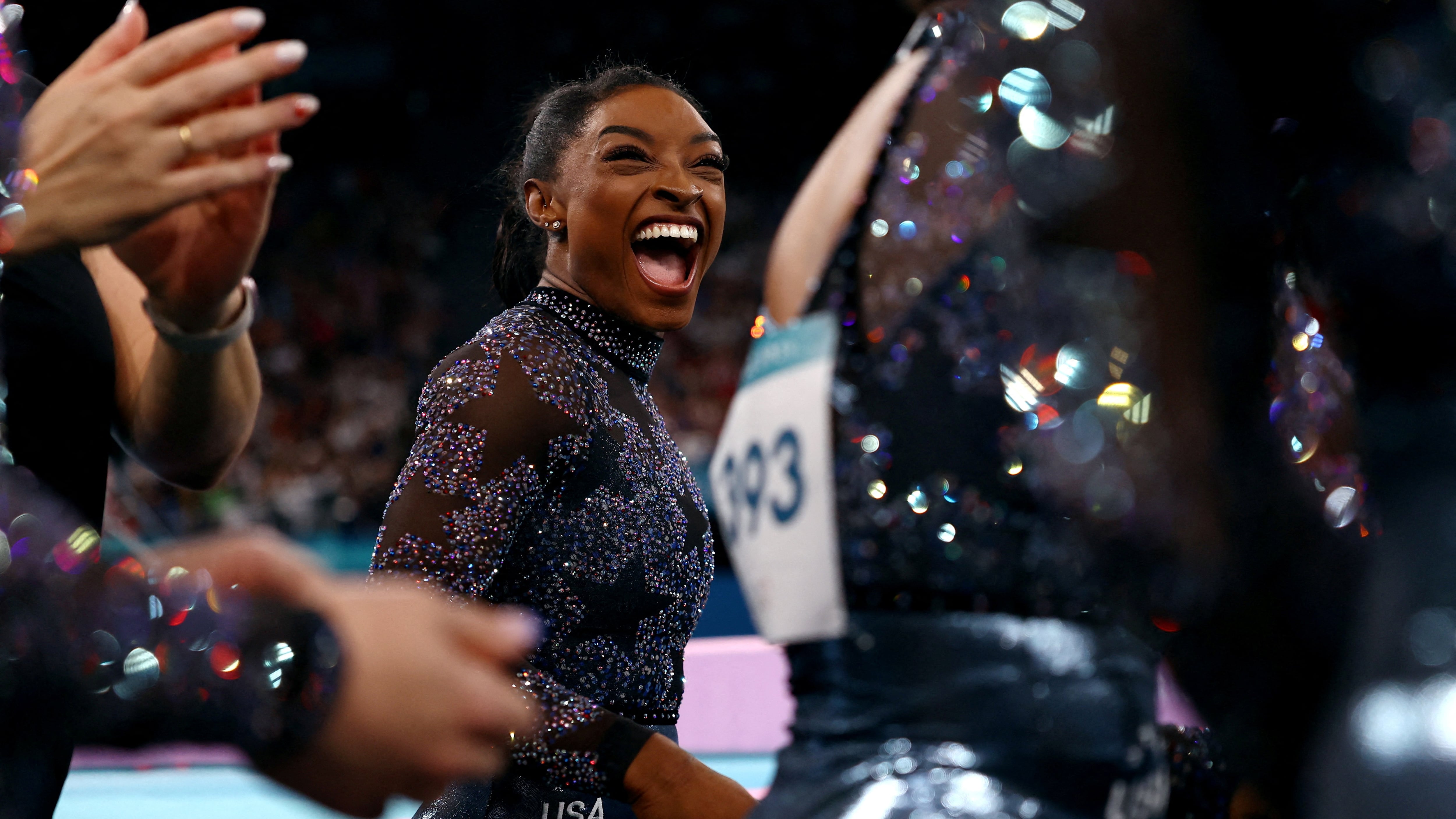 Paris 2024 Olympics - Artistic Gymnastics - Women's Qualification - Subdivision 2 - Bercy Arena, Paris, France - July 28, 2024. Simone Biles of United States reacts after her performance on the Balance Beam. REUTERS/Hannah Mckay     TPX IMAGES OF THE DAY