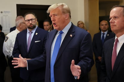 Donald Trump delivers remarks before the trial in a New York courtroom on Monday. 