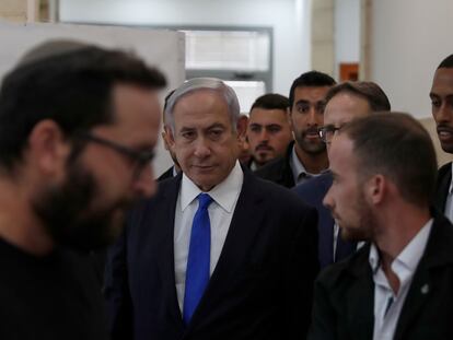 Israeli Prime Minister Benjamin Netanyahu, center, arrives at the District Court in Jerusalem, Israel, Sunday, June 25, 2023.