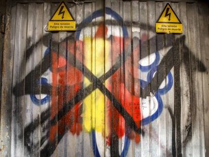 Pintada actual en una puerta de suministro el&eacute;ctrico en Palma