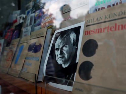 Milan Kundera's picture is seen among his books in a shop window in Prague, Czech Republic, July 12, 2023. REUTERS/David W Cerny