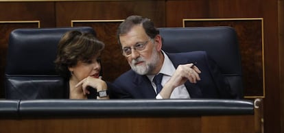 Soraya Sáenz de Santamaría and Mariano Rajoy