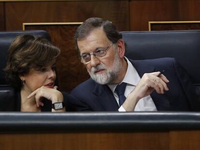 Soraya Sáenz de Santamaría and Mariano Rajoy