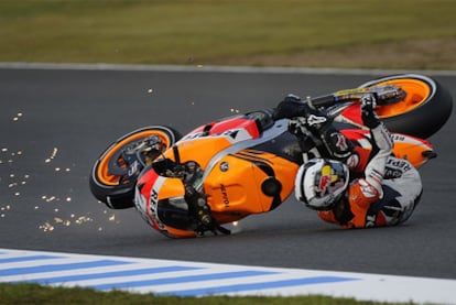 Dani Pedrosa falls during a practice session in Japan in 2010.