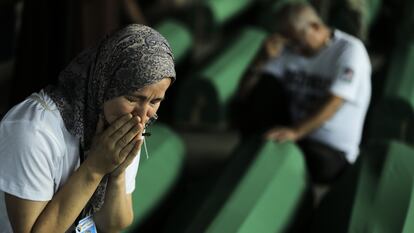Relatives of victims of the 1995 Srebenica genocide weep at the Potocari Memorial Cemetery ahead of commemoration to mark the 28th anniversary on July 10, 2023.