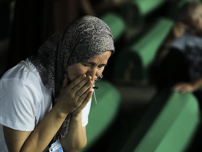 Relatives of victims of the 1995 Srebenica genocide weep at the Potocari Memorial Cemetery ahead of commemoration to mark the 28th anniversary on July 10, 2023.