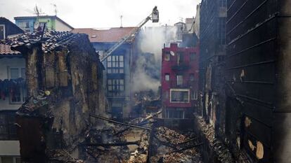 Debris and burned buildings in Bermeo on Thursday.