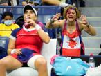 Sep 6, 2021; Flushing, NY, USA; Bianca Andreescu of Canada (left) takes a drink during a change as fans cheer her on in the third set against Maria Sakkari of Greece on day eight of the 2021 U.S. Open tennis tournament at USTA Billie Jean King National Tennis Center. Mandatory Credit: Robert Deutsch-USA TODAY Sports