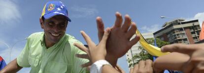 Henrique Capriles greets supporters in La Guaira, Vargas state on Monday. 