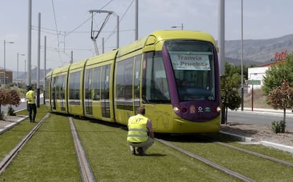 Technicians inspect one of Ja&eacute;n&rsquo;s trams during a testing period in June 2012. 