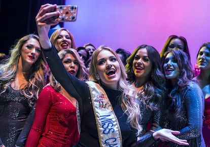 The recently crowned Miss Carnival poses with friends in Little Havana.