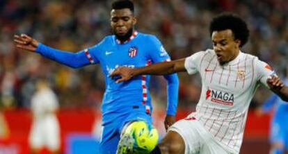 Un momento de un partido entre el Sevilla y el Atlletico Madrid.