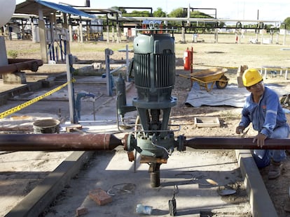 An employee works at a natural gas plant near Santa Cruz, Bolivia.
