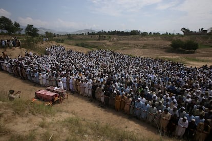 People attend funeral prayers for victims, who were killed in a blast, in Bajaur district of Khyber Pakhtunkhwa province, Pakistan, on July 31, 2023.