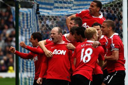 Los jugadores del United celebran la Liga.