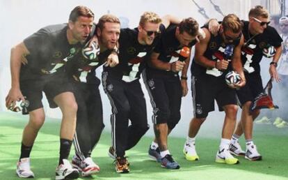 German players celebrating their win in Berlin.