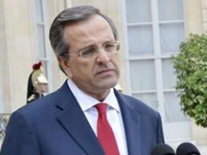 El primer ministro griego Andonis Samarás junto con su homólogo francés, François Hollande.