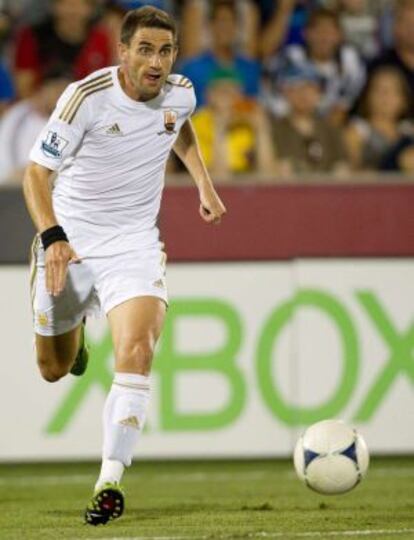 Joe Allen, en un partido con el Swansea. El jugador galés ha sido presentado como inglés en el programa olímpico oficial de la delegación británica.
