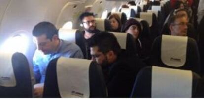 Tsipras volando, en clase turista, de Atenas a Berlín.