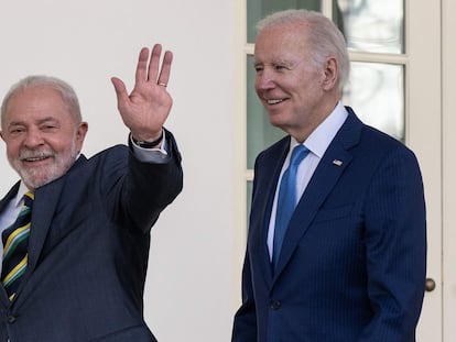 US President Joe Biden and Brazilian President Luiz Inacio Lula da Silva walk together along the Rose Garden colonnade at the White House in Washington, DC, February 10, 2023.