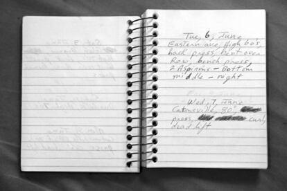 BALTIMORE, MD - DECEMBER 05: A detailed view of a Keith Boissiere's running journal dated Tuesday, June 6, 2000 is seen on December 5, 2016 in Baltimore, Maryland. In the form of yearly journals, the 'Running Man' writes short descriptions of his runs in small spiral notebooks which include: the weather, location, and other types of exercise. Whether hot or cold, in the tranquil streets of the county or a problematic block of West Baltimore, it's jotted down in ink. However, there is one traumatic situation he cannot erase from his memory. In November 2014, Boissiere was attacked during a run that left him with a cut and bruise on his face. Keith Boissiere has been running nearly every day for the past three decades - averaging more than 20 miles per day - for his health. Many residents only know the enigmatic figure by his nickname of the 'Running Man.'   Patrick Smith/Getty Images/AFP
== FOR NEWSPAPERS, INTERNET, TELCOS & TELEVISION USE ONLY ==