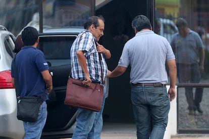 Bolivian authorities arresting the head of Lamia airlines.