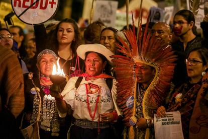 Indigenous Chilean activists at the march in Madrid.