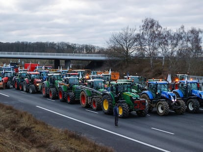 French farmers block a highway with their tractors during a protest in Longvilliers, near Paris, France, January 30, 2024.