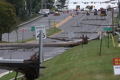 Downed power lines can be seen the day after a powerful storm swept the region along Baltimore Blvd in Westminster, Maryland, U.S., on August 8, 2023.