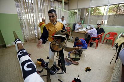 Syrian jockey, Mohannad Ghorly, prepares for the second round of the horse race at Beirut Hippodrome, Lebanon, June 18, 2017. REUTERS/Jamal Saidi  SEARCH "SAIDI HIPPODROME" FOR THIS STORY. SEARCH "WIDER IMAGE" FOR ALL STORIES.
