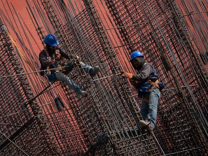 Trabajadores en la construcción de un edificio en la colonia Condesa (Ciudad de México), en diciembre de 2022.
