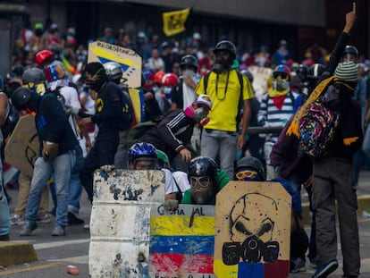 Manifestantes em Caracas neste s&aacute;bado.