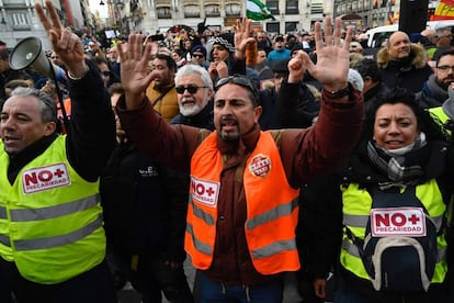 Spanish taxi drivers protest outside the Madrid regional government in Puerta del Sol.