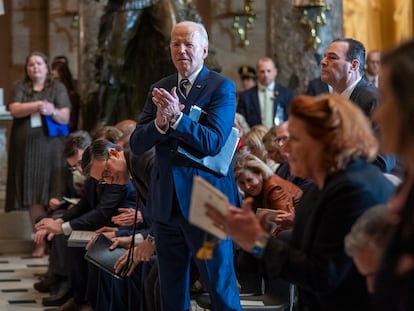 US President Joe Biden (C) applauds Italian tenor Andrea Bocelli during the National Prayer Breakfast in Statuary Hall of the US Capitol in Washington, DC, USA, 01 February 2024.