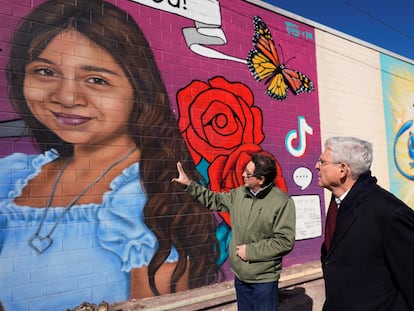 Artist Abel Ortiz gives Attorney General Merrick Garland a tour of murals of the Uvalde shooting victims, in Uvalde, Texas, U.S., January 17, 2024.