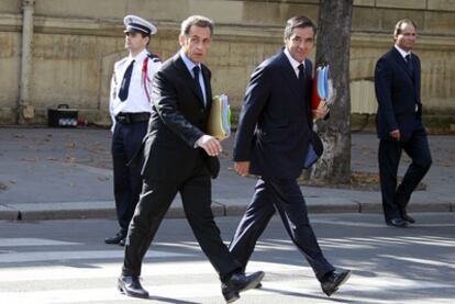 Sarkozy (izquierda) y su primer ministro, François Fillon, el pasado 1 de agosto.