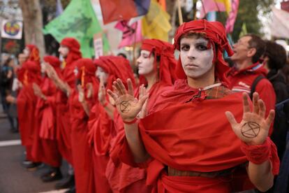 Members of the Extinction Rebellion group in Madrid take part in the climate change march in Madrid.